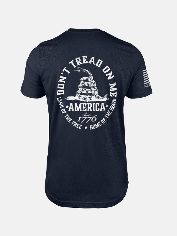Navy t-shirt with 'Don't Tread on Me' graphic and text on a patriotic shirt by FreedomBuilt