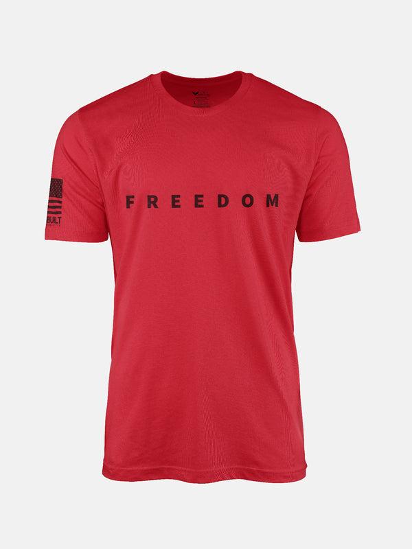 Red t-shirt with 'FREEDOM' text and small flag on a patriotic shirt by FreedomBuilt