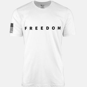 White t-shirt with 'FREEDOM' text and small flag on a patriotic shirt by FreedomBuilt