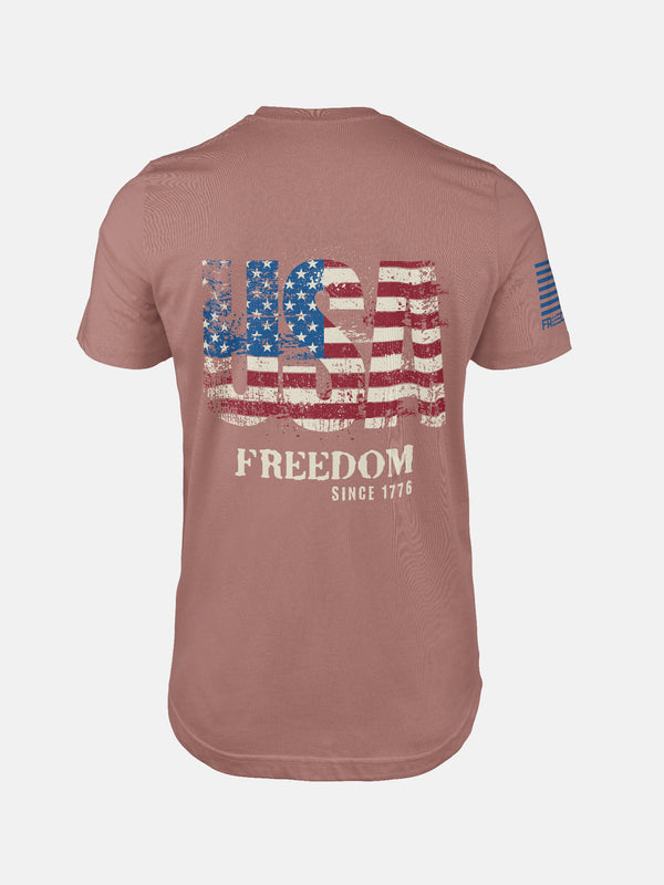 Mauve t-shirt with 'USA Freedom' text and American flag design on a patriotic shirt by FreedomBuilt